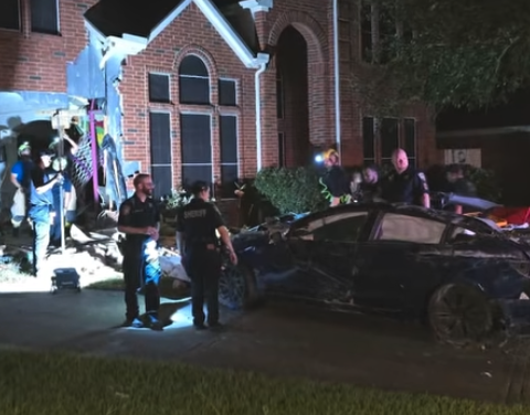 Tesla drives through house